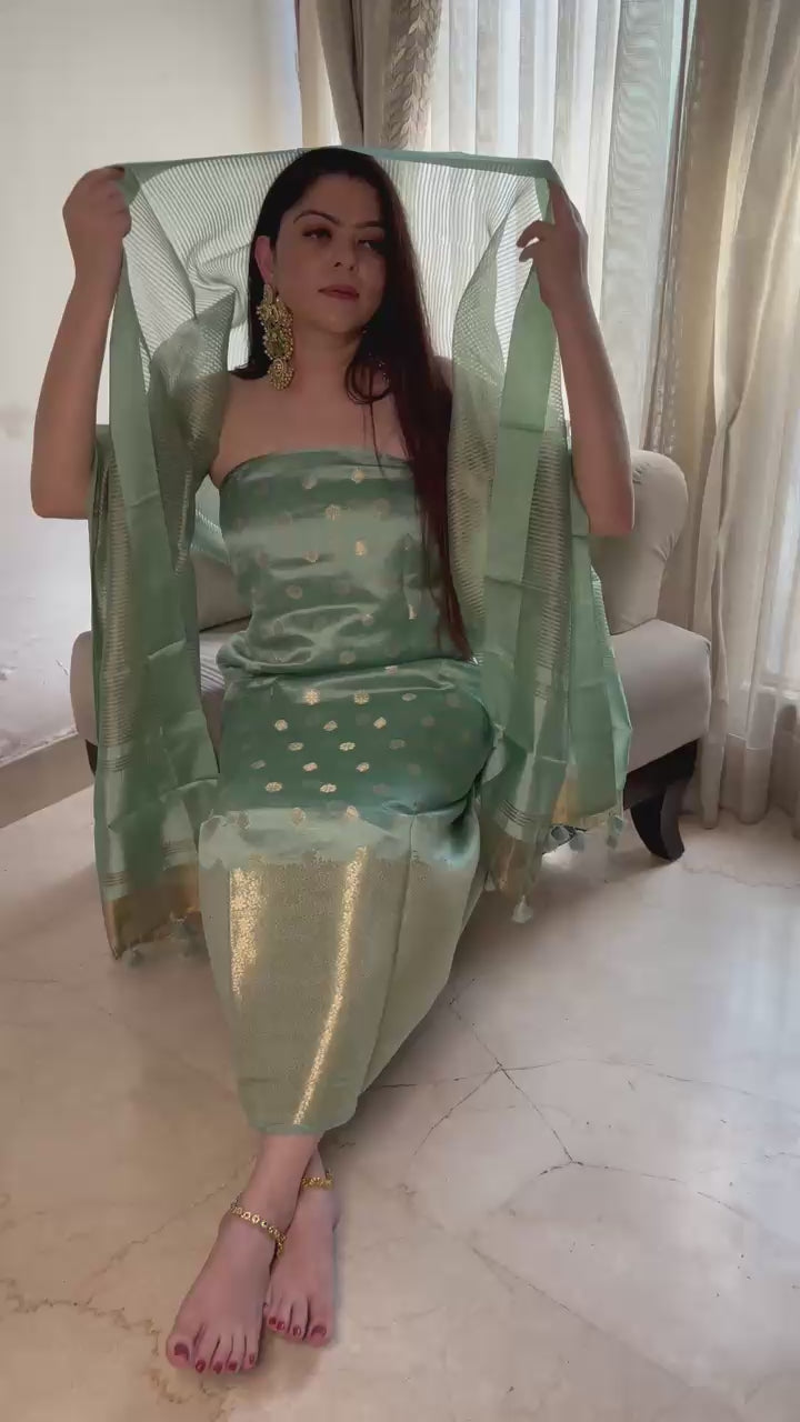 Pure Raw Mango Silk Festive Suit Set with Golden Zari Weaving & Tassels